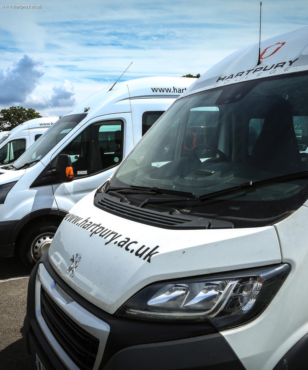 Image of Hartpury minibuses parked up